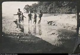 'The sand-larks', women and children in inlet at beach, Aulua, Malekula