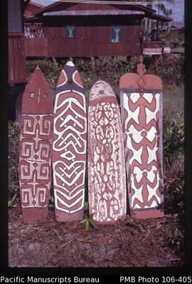 [Shields from the Asmat Museum in Agats representing four style regions; from left: Central Asmat...