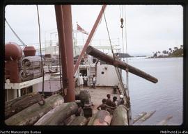 'Loading logs for New Zealand in Gizo harbour'