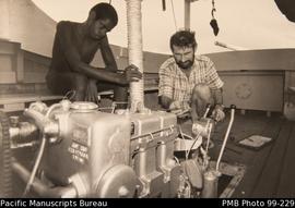 John Cunningham and assistant checking engine of "envoy"