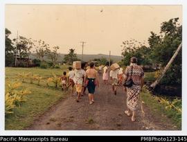 Walking to Richard Arbon's honourary title bestowal ceremony given to missionaries. Satupaitea, S...