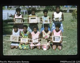 'Sunday School teachers [?] show picture boxes, Vila area'