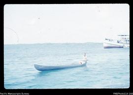 'John Baker canoeing, Wagina Island'