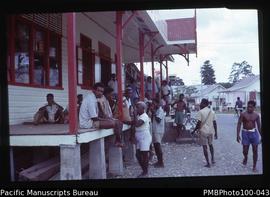"Crowds outside Quan Hong store, Chinatown, Honiara"