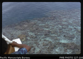 'Coral reef seen from bow of MV Komaiwai, Fiji'