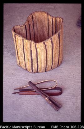 [Fire-making equipment and chest shield/protector or rattan cuirass, Moni tribe]