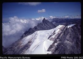 [Glacier with Puncak Jaya in center above it]