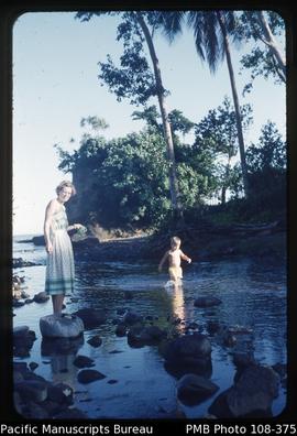 MG [Mary Grace] and Michael having early morning swim in river - South West Bay