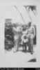 Two men in uniform (Powell and Roper) standing with woman (Terea Tou)  and two children (Tiorgi i...