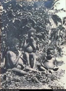 'Eating paw paw', two unknown children with Neli and Janet, probably Wintua mission station, Male...