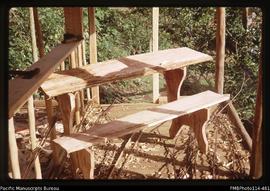 'Finished school desks made from buttress roots at the school in Sikile Village, Roviana Lagoon'