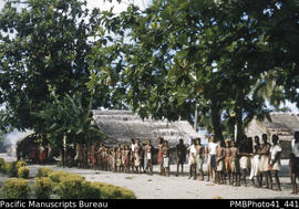 Church & greeting of District Commissioner. Locals lined up, “shake hand”, Tuwo Village, Reef...