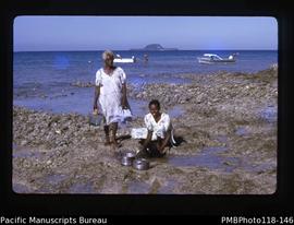 'Women wash pots on reef, Lelepa'