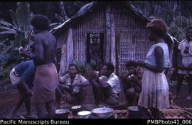 [People eat meal together at] 'Tigoa near Kolosulu, Guadalcanal'