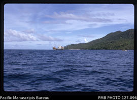 'MV Komaiwai up on the reef at Munia Island as seen from a distance, Fiji'
