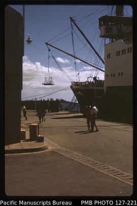 'MV Tofua working cargo at Queen Salote Wharf. Underexposed. Tonga'