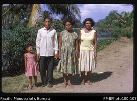 "Tikopian family, Matanikau bridge behind"