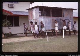 'Moving a store shed at Geology Dept, Honiara'
