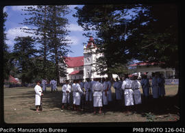 'Tonga Police Force Band in dress uniforms gathering on the Pangai, Tonga'