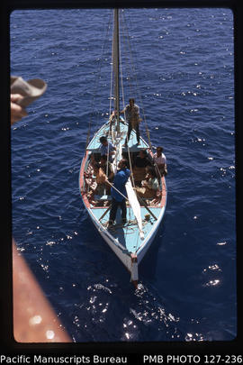 'Sailing cutter coming alongside MV Olovaha, Tonga'