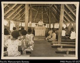 Rev. John Hyslop preaching to congregation at Pele