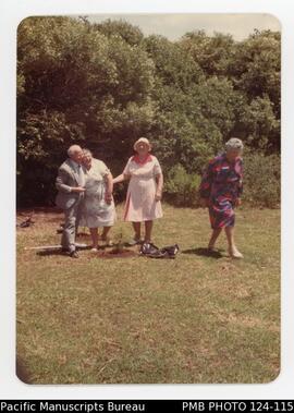 'Pus' Quintal and 'Nella' Adams, direct descendants from Pitcairn Islands, planting the centenary...