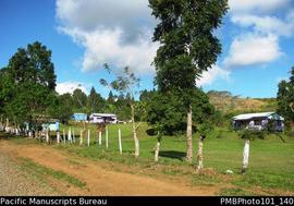[Nausori Highlands Road from Nadi Back Road to Bukuya  school buildings and playing field]