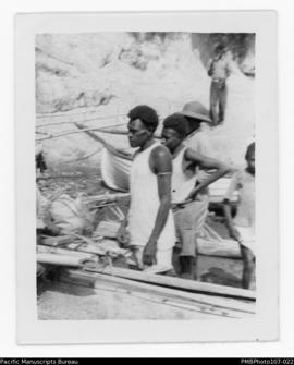 Men in boats, probably Malekula