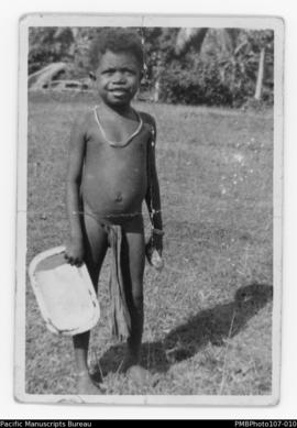 Young child holding dish, probably Malekula