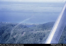 'Weather Coast, just west of Avu Avu, South Guadalcanal. Aerial view.'