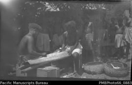 Pamua girls grating cassava