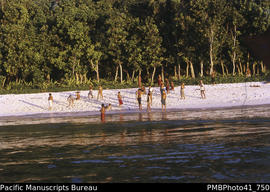 [Children playing] Landing beach at sunset, Tikopia
