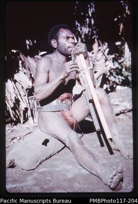 ‘Big Nambus bushman plays pipes, Malekula’