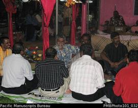 [Suva Wedding Guests in front of dais on which the band played.  Brij Lal in blue and white shirt.]