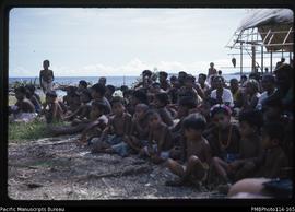 'Te Kiribas (Gilbertese) children spectating, Boxing Day dancing at Kukutin Village, Wagina Island'