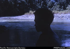 [Person in profile at] 'Simiu River, Guadalcanal'