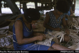Women weaving baskets, Rennell