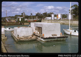 'Fathom Fisheries concrete barges in Touliki Harbour, Tonga'