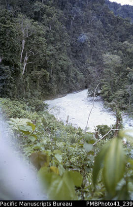 'Sutakama River in flood near Nuhu, Guadalcanal'