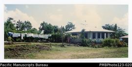 Missionary's house at the Uesiliana College compound with a clothesline. Satupaitea, Savaii