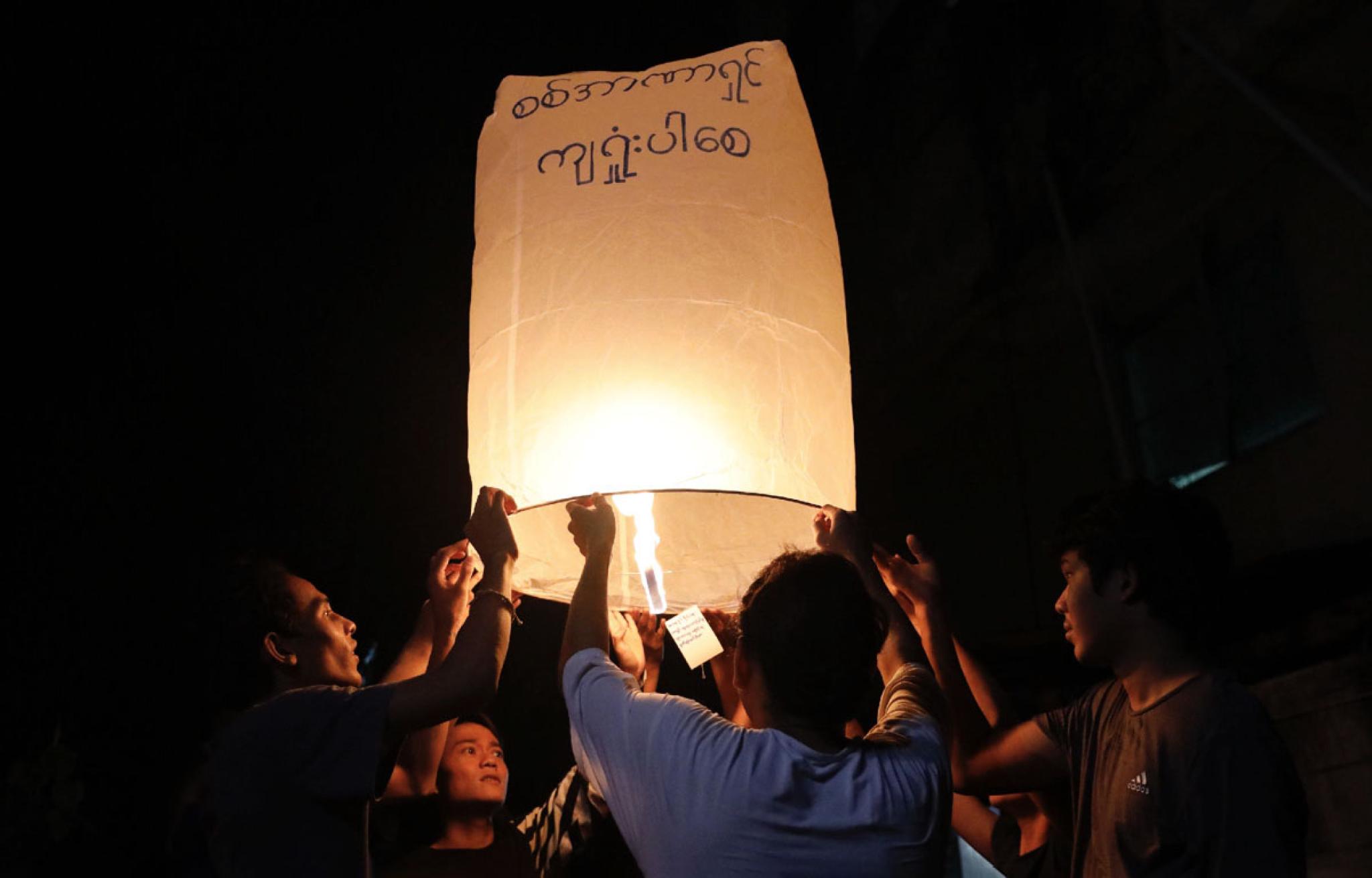 People letting sky lanterns in Myanmar