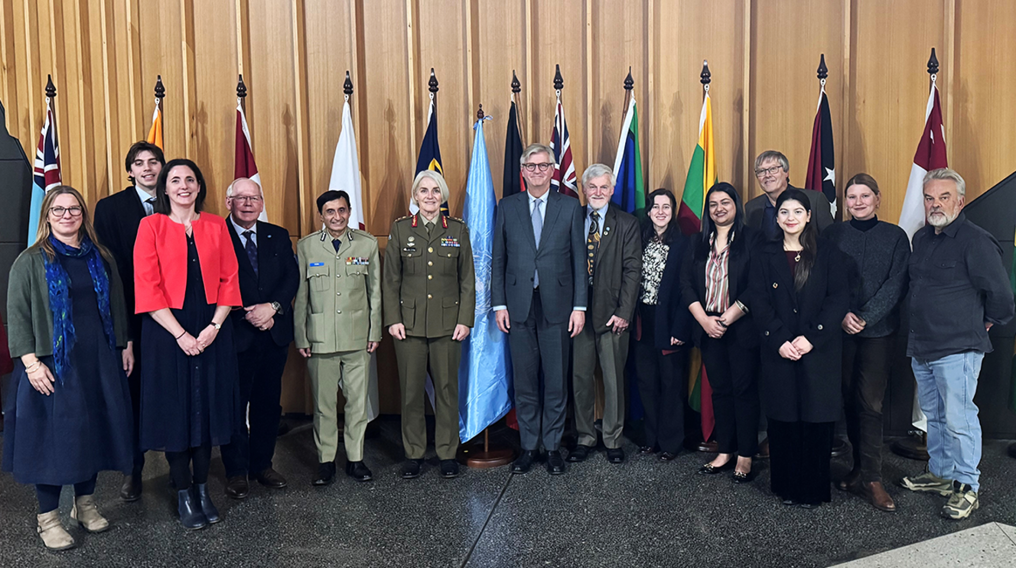 Bell School academics with UN leadership and interns